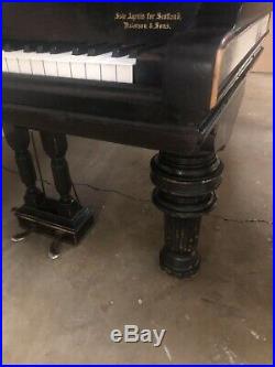 1884 Steinway Model B grand piano for sale with a black case on Victorian Legs