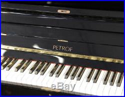 2004, Petrof upright piano with a black case and brass fittings. 3 year warranty