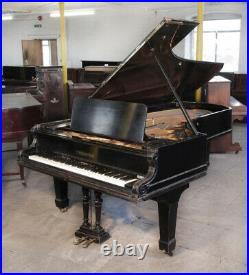 A 1900, Bechstein model E grand piano with a polished, black case and spade legs