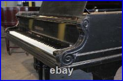 A 1900, Bechstein model E grand piano with a polished, black case and spade legs