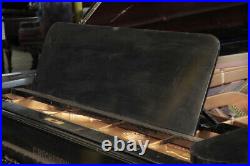 A 1900, Bechstein model E grand piano with a polished, black case and spade legs