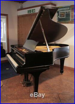 A 1902, Steinway Model O grand piano with a black case and spade legs