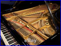 A 1925, Steinway Model C grand piano with a black case. 3 year warranty