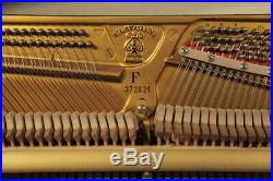 A 1961, Steinway Model F upright piano with a black case. 3 year warranty