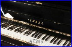 A 1969, Yamaha U3 upright piano with a black case. 3 year warranty