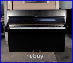 A 1971, Sauter 108 Upright Piano with a Black Case and Brass Fittings