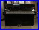 A-1971-Yamaha-Upright-Piano-with-a-Black-Case-and-Brass-Fittings-01-wo