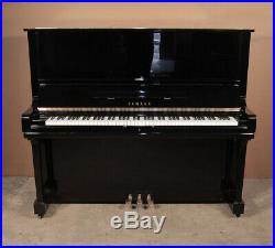 A 1972, Yamaha U3 upright piano with a black case. 3 year warranty