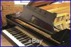 A 1974, Steinway Model O grand piano with a black case. 3 year warranty