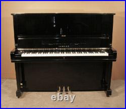 A 1975, Yamaha U3 upright piano for sale with a black case. 3 year warranty