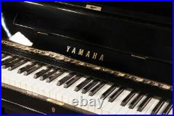 A 1975, Yamaha U3 upright piano for sale with a black case. 3 year warranty