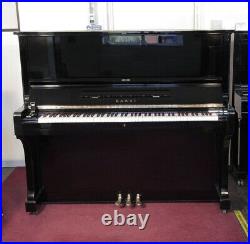 A 1976, Kawai BL-61 upright piano with a black case. 3 year warranty