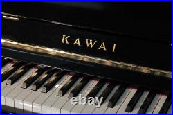 A 1976, Kawai BL-61 upright piano with a black case. 3 year warranty