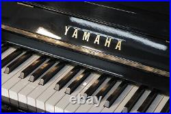 A 1976, Yamaha U1 upright piano with a black case. 3 year warranty
