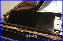 A 1979, Yamaha C7 concert grand piano with a black case. 3 year warranty