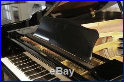 A 1979, Yamaha G3 grand piano with a black case. 3 year warranty
