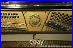 A 1980, Yamaha U2 upright piano with a black case. 3 year warranty