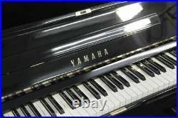 A 1980, Yamaha U2 upright piano with a black case. 3 year warranty