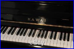 A 1985, Kawai NS-10 upright piano with a black case. 3 year warranty