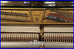 A 1985, Steinway Model K upright piano with a black case. 3 year warranty