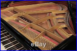 A 1988, Yamaha GH1 baby grand piano with a black case. 3 year warranty