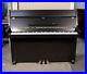 A-1988-Young-Chang-Upright-Piano-with-a-Satin-Black-Case-and-Brass-Fittings-01-zp