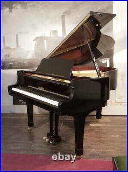 A 1989, Yamaha G2 grand piano with a black case. 3 year warranty