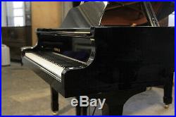 A 1993, Yamaha G3 grand piano with a black case. 3 year warranty