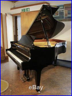 A 2000, Boston GP178 PE grand piano with a black case. Designed by Steinway