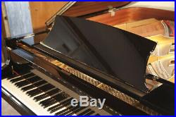 A 2000, Boston GP178 PE grand piano with a black case. Designed by Steinway