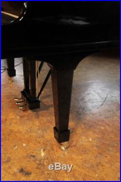 A 2003, Steinway Model A grand piano with a black case and spade legs