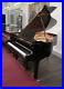 A-2003-Yamaha-C2-grand-piano-with-a-black-case-and-spade-legs-01-dslm
