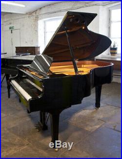 A 2004, Yamaha C3 grand piano for sale with a black case and spade legs