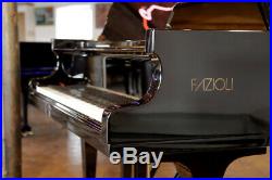 A 2006, Fazioli F212 grand piano with a black case. 3 year warranty