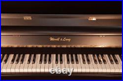 A 2008, Wendl & Lung Model 122 Upright Piano with a Black Case. 3 Year Warranty