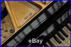 A 2011, Hoffmann V158 baby grand piano with a black case. 3 year warranty