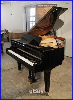 A 2015, Yamaha GB1 baby grand piano with a black case. 3 year warranty