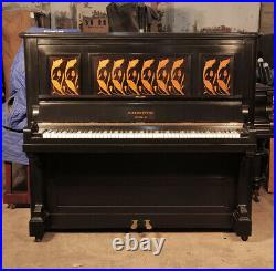 An 1897, Bechstein upright piano with a black case and striking floral inlay