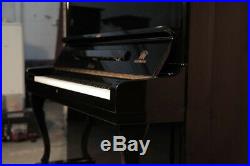 Atlas Mod A20 upright piano with a black case and cabriole legs. 12month warranty
