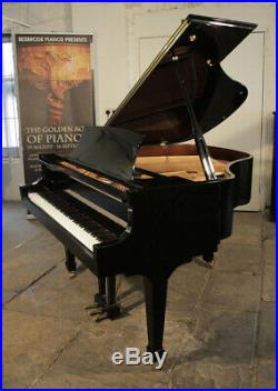 Essex EGP155 baby grand piano with a black case. Designed by Steinway
