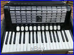 Hohner Accordian Tango IV P exceptional condition, in piano black, with case