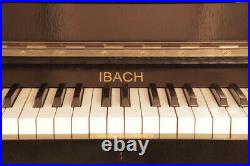 Ibach upright piano with a black case and brass fittings. 2 year warranty