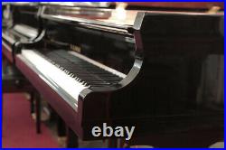 Kawai GX-2 grand piano with a black case and fitted PianoDisc SilentDrive system