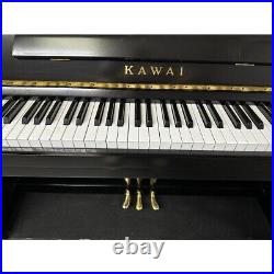Kawai Upright piano in black satin case. Comes with guarantee & we can deliver