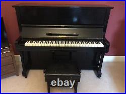 Montague Upright Piano. Black wooden case with metal pin block. Fully working