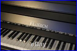 New, Feurich 123 upright piano with a satin, black case & high speed KAMM action