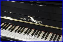 New Wilh Steinberg Model AT-K30 upright piano with a black case. 5 year warranty