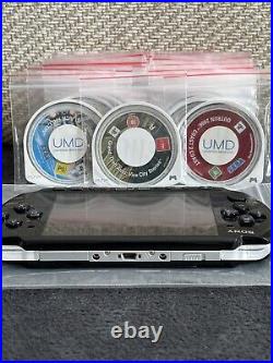 PSP 3003 console with offical Sony charger! 31 UMD Games & 70 Games, Spare Cases