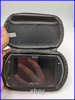 PSP Go Piano Black INCLUDES CHARGER & CASE