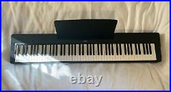 Pre-loved Yamaha P-145 digital piano with foot pedal, stand, books and soft case